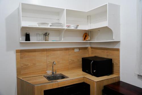 Kuchyň nebo kuchyňský kout v ubytování TOBY HOUSE SiARGAO