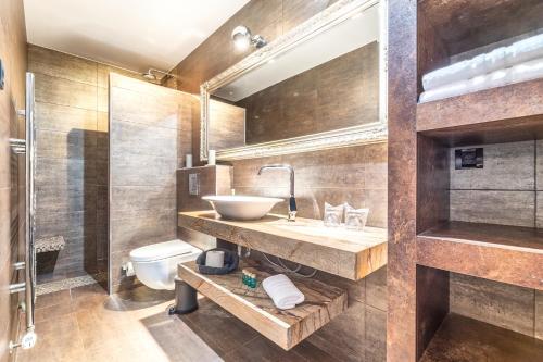 Kúpeľňa v ubytovaní Log In Rooms