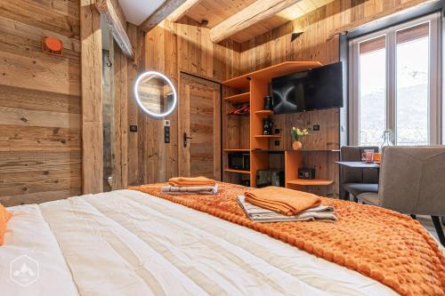 Giường trong phòng chung tại L'Autentic