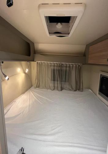 Katil atau katil-katil dalam bilik di Gemütlicher Camper-Wiesnnah