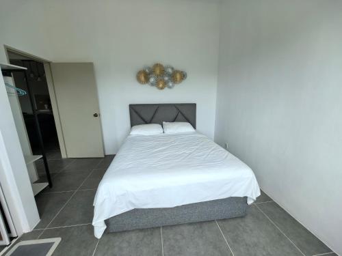 Katil atau katil-katil dalam bilik di Langkawi Simfoni Forest Suite