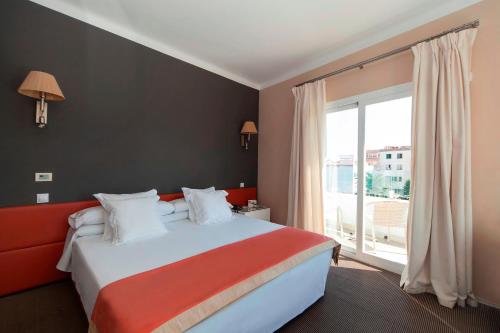 Postel nebo postele na pokoji v ubytování Portofino Mallorca