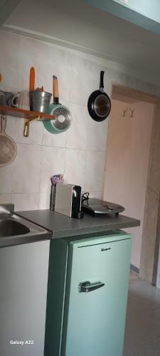 Η κουζίνα ή μικρή κουζίνα στο Trulli & Case Fichi 3