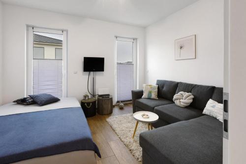 Una televisión o centro de entretenimiento en Ferienwohnung Spanier