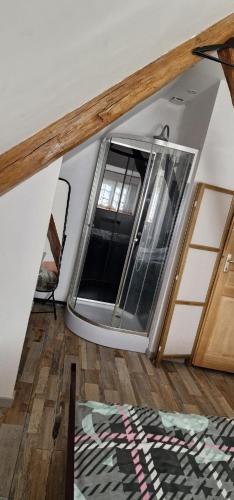 a room with a large window in a house at Chambres d'Hôtes Chez Jean in Spoy