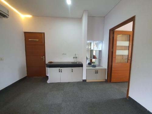 Kuchyň nebo kuchyňský kout v ubytování Mallenzo Suites Dlf Phase 1