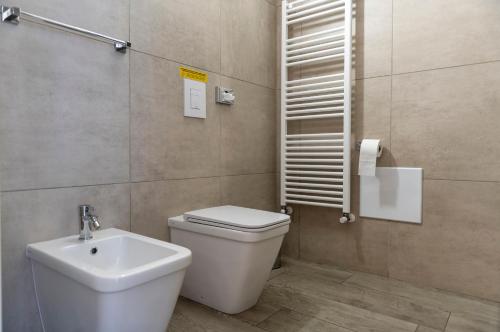 Ένα μπάνιο στο VILLA FENIX OSIO SOTTO 2