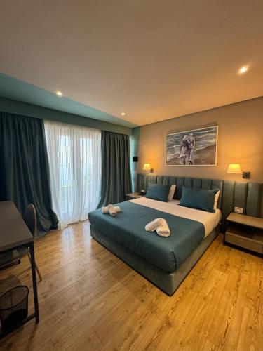 Postel nebo postele na pokoji v ubytování Festim Villa Hotel