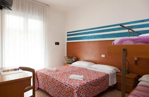 Cama o camas de una habitación en Hotel Edera