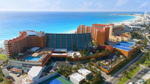 an aerial view of a resort and the ocean at Crown Paradise Club Cancun - All Inclusive in Cancún
