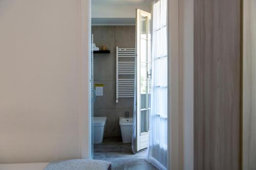 Ένα μπάνιο στο VILLA FENIX OSIO SOTTO 2