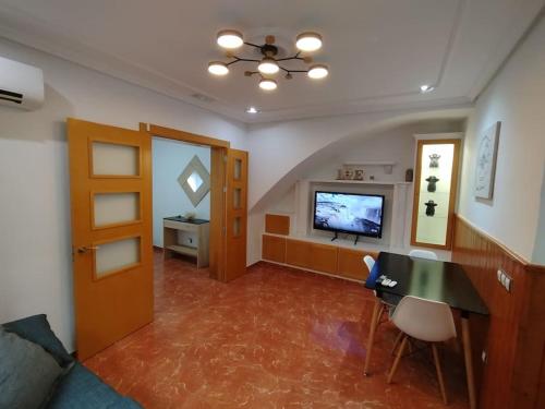 TV a/nebo společenská místnost v ubytování Casa planta baja en Gador