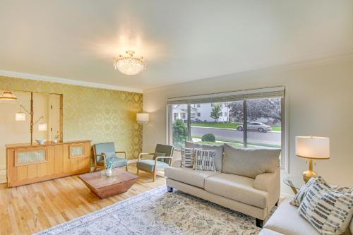 a living room with a couch and a table at Walk to Downtown Brigham City Family Home in Brigham City