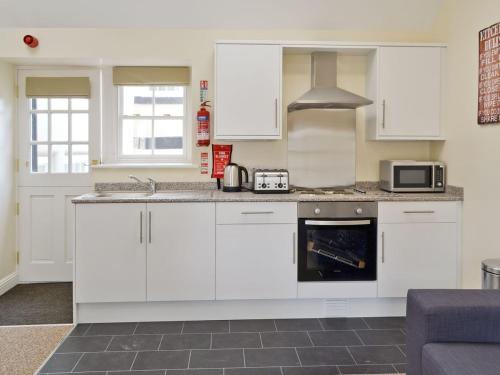 A kitchen or kitchenette at The Castle 