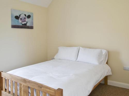 A bed or beds in a room at The Castle 