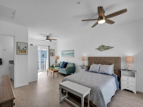 a bedroom with a bed and a ceiling fan at Best Catch on Grouper LN at Ocean Isles in Marathon