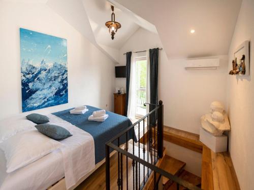 Ένα ή περισσότερα κρεβάτια σε δωμάτιο στο Stone House Lola - Two Bedroom Holiday Home