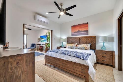 a bedroom with a bed and a ceiling fan at 2BD-2BA Condo at Ventanas 3B in Cabo San Lucas