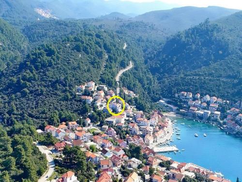 an aerial view of a town next to a body of water at Bertie's Lodge - Two Bedroom Apartment with Terrace and Sea View A1 in Smokvica