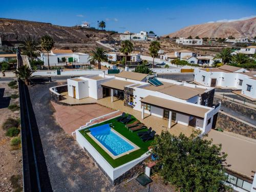 an aerial view of a villa with a swimming pool at Villa Volcan2 Rural Private Pool la Oliva by Holidays Home in La Oliva