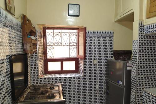 Kuchyň nebo kuchyňský kout v ubytování Appartement lala Houriya fez