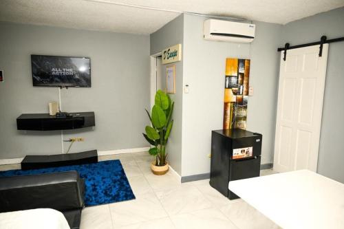 Ein Bett oder Betten in einem Zimmer der Unterkunft D'escape at Seawind on the Bay