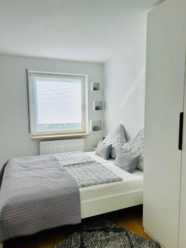 Katil atau katil-katil dalam bilik di Ferienwohnung Refugium