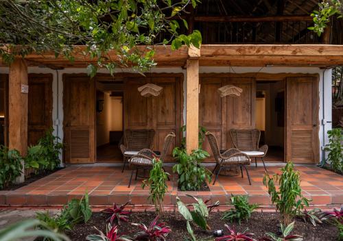 Un jardín fuera de Hotel Hacienda Combia