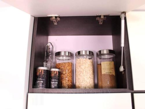 a pantry filled with lots of different spices at Luxury Studio in El Poblado Modern Charm in Envigado