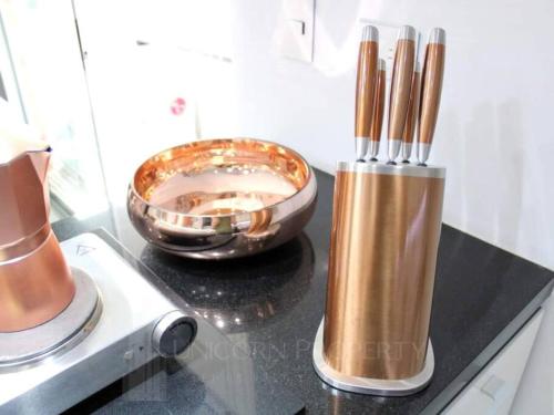 a counter with two chopsticks and a bowl on it at Luxury Studio in El Poblado Modern Charm in Envigado