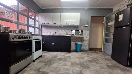 Kuchyň nebo kuchyňský kout v ubytování Hostel Kuntur