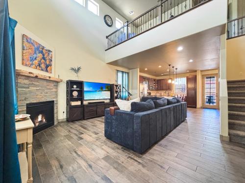 a living room with a couch and a fireplace at Fun & Peaceful Family Retreat in Flagstaff
