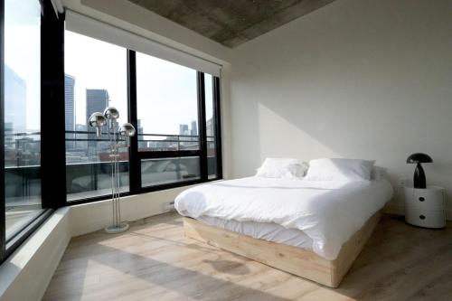 Ένα ή περισσότερα κρεβάτια σε δωμάτιο στο Appartement de luxe avec piscine
