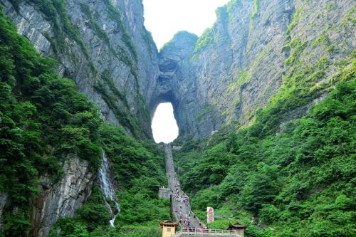a tunnel in the middle of a mountain at 张家界大庸家民宿天门山索道站店DYJ Residential hostel in Zhangjiajie