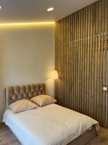 Ένα ή περισσότερα κρεβάτια σε δωμάτιο στο Seaside apartments 4