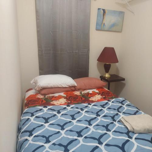 Postel nebo postele na pokoji v ubytování Deluxe Room E