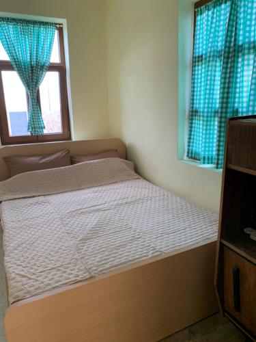 Postel nebo postele na pokoji v ubytování Seosko turističko domaćinstvo Biser