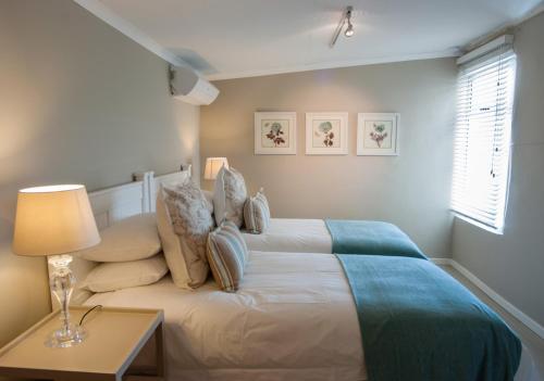 Ein Bett oder Betten in einem Zimmer der Unterkunft Sneezewood Farm Bed&Breakfast and Self-Catering Cottage
