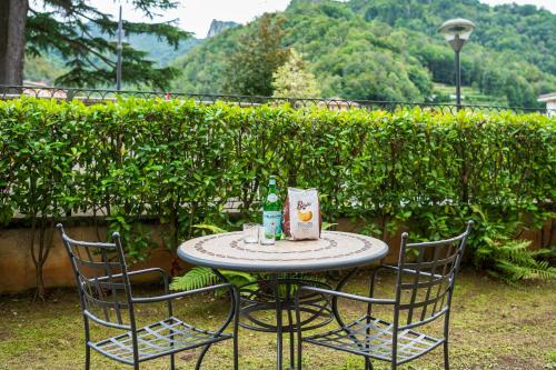 Un jardín fuera de Elegante & Centrale Relax a 2 min dalle QC Terme