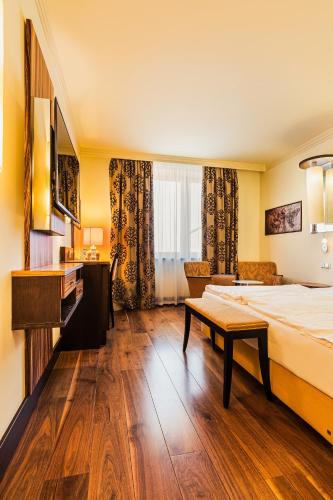 Una cama o camas en una habitación de Hotel Savannah
