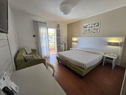 Postel nebo postele na pokoji v ubytování Hotel Mare