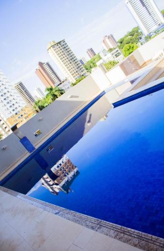 Πισίνα στο ή κοντά στο Hotel Baviera Iguassu