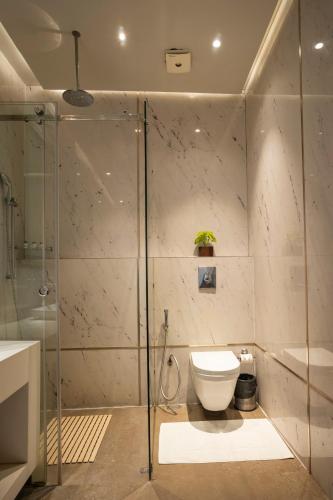 Koupelna v ubytování Udman Hotel Greater Noida