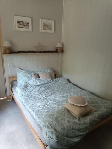 Postel nebo postele na pokoji v ubytování Gîte plain-pied avec jardin terasse