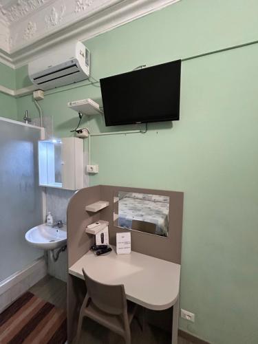 TV a/nebo společenská místnost v ubytování Hotel Barone