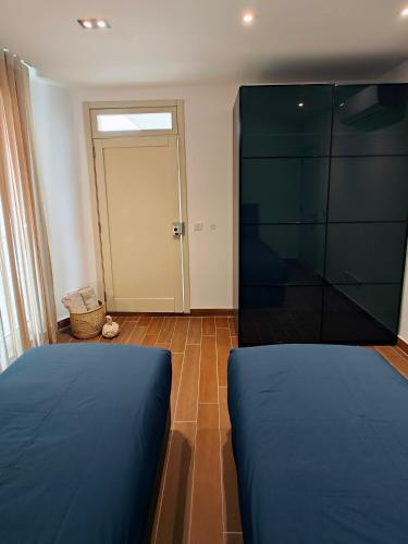 Postel nebo postele na pokoji v ubytování Seascape 24