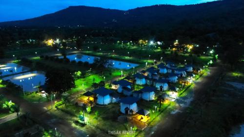 an aerial view of a resort at night at Thisak Resort Cheung phnom kulen in Siem Reap