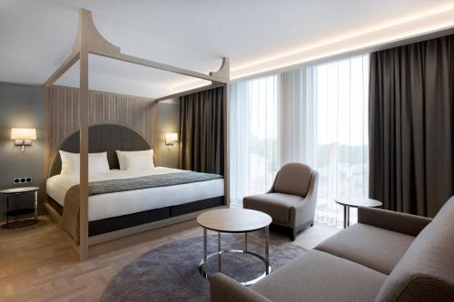 Postel nebo postele na pokoji v ubytování Nordic Hotel Forum