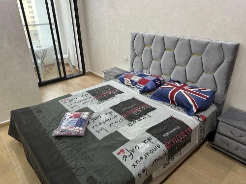 Ένα ή περισσότερα κρεβάτια σε δωμάτιο στο Appartement neuf