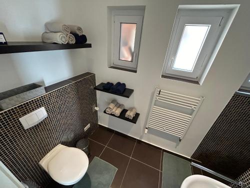 Ένα μπάνιο στο Ferienwohnung Möhlenwarf